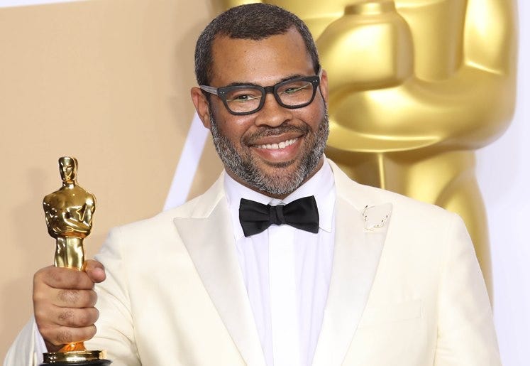 March 4, 2018; Hollywood, CA, USA; Jordan Peele, winner of the award for best original screenplay for \"Get Out\", poses in the photo room during the 90th Academy Awards at Dolby Theatr