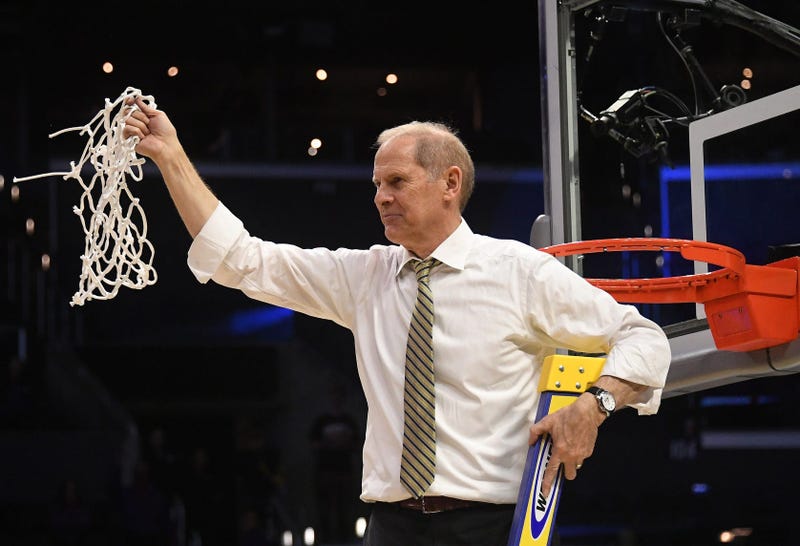 Mar 24, 2018; Los Angeles, CA, USA; Michigan Wolverines head coach John Beilein cuts down the net after defeating the Florida State Seminoles in the championship game of the West regional of the 2018 NCAA Tournament at STAPLES Center. Mandatory Credit: Ri