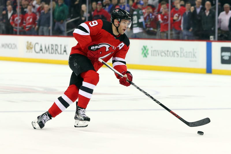 FILE -- Taylor Hall skates with the puck on a penalty shot during the second period of their game against the New York Rangers at Prudential Center.