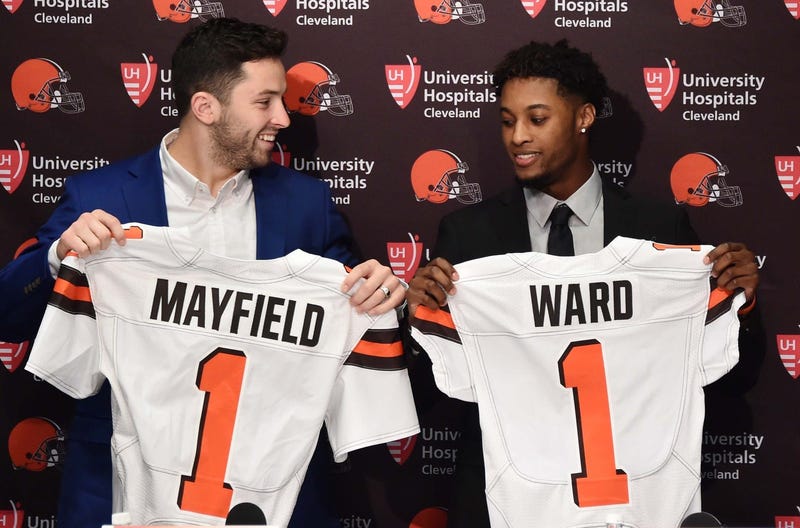 Cleveland Browns first round picks, Baker Mayfield , left, and Denzel Ward show off Browns jerseys during a press conference at the Cleveland Browns training facility. 