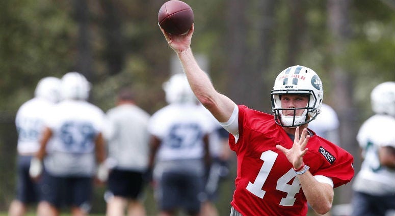New York Jets quarterback Sam Darnold (14) throws the ball during New York Jets rookie mini camp at Atlantic Health Training Center.