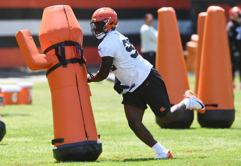 Cleveland Browns defensive lineman Chad Thomas (92) runs a drill during organized team activities at the Cleveland Browns training facility.