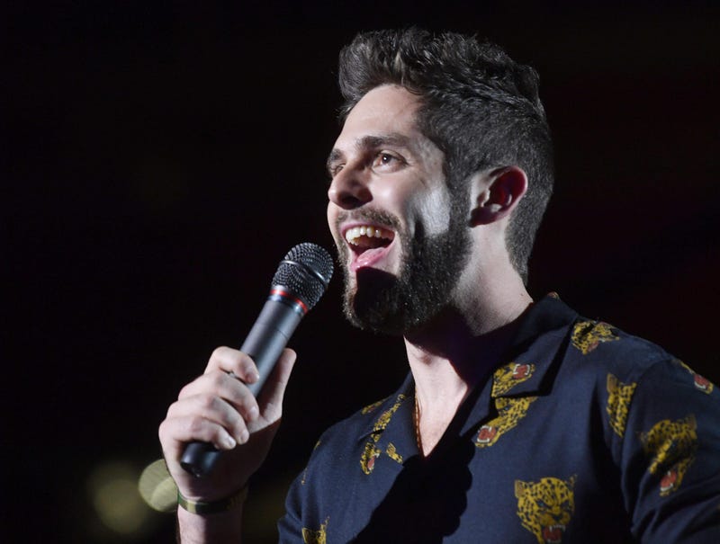 Show host Thomas Rhett talks to the crowd during the 2018 CMA Music Festival. 
