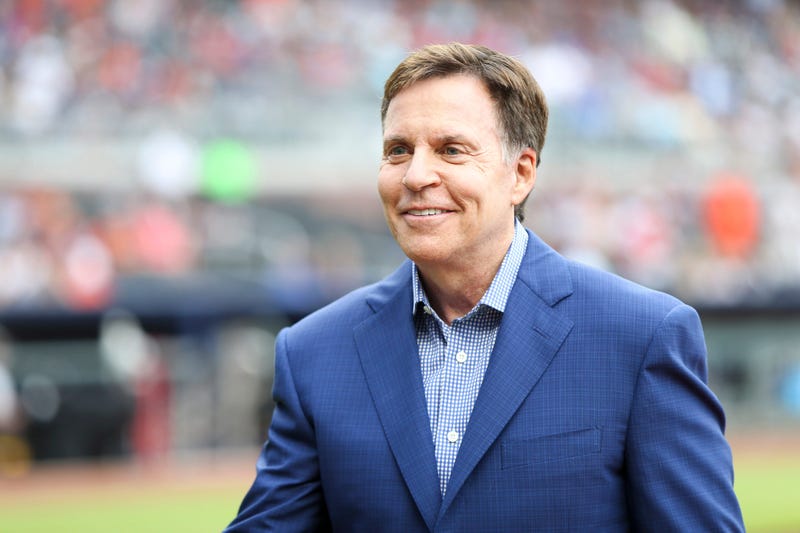 Sportscaster Bob Costas on the field before a game