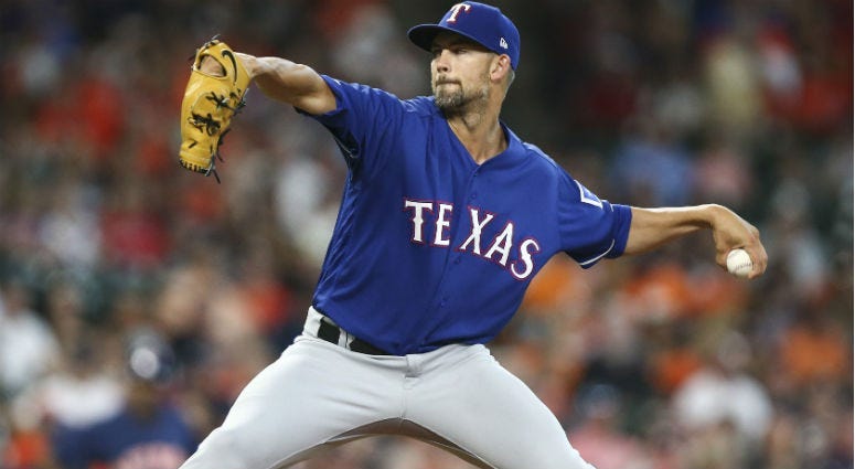 Mike Minor delivers a pitch during the first inning against the Houston Astros at Minute Maid Park.