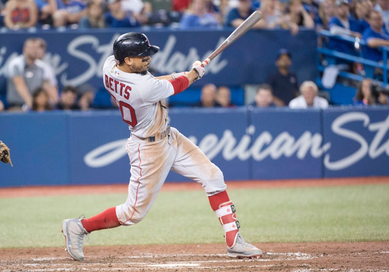 Mookie Betts hitting a home run in the ninth inning completing his first cycle against the Toronto Blue Jays