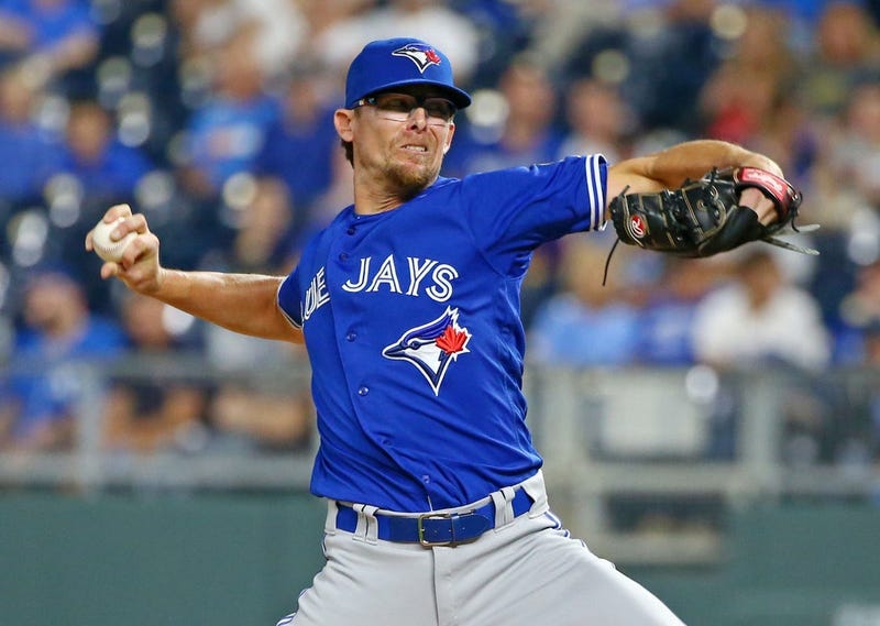 Aug 14, 2018; Kansas City, MO, USA; Toronto Blue Jays relief pitcher Tyler Clippard (36) pitches against the Kansas City Royals in the eighth inning at Kauffman Stadium. Mandatory Credit: Jay Biggerstaff-USA TODAY Sports