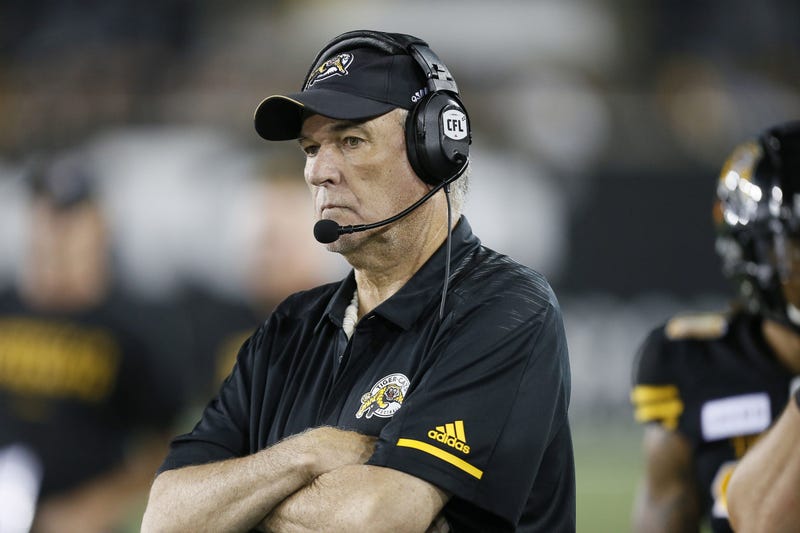 June Jones with the Tiger Cats