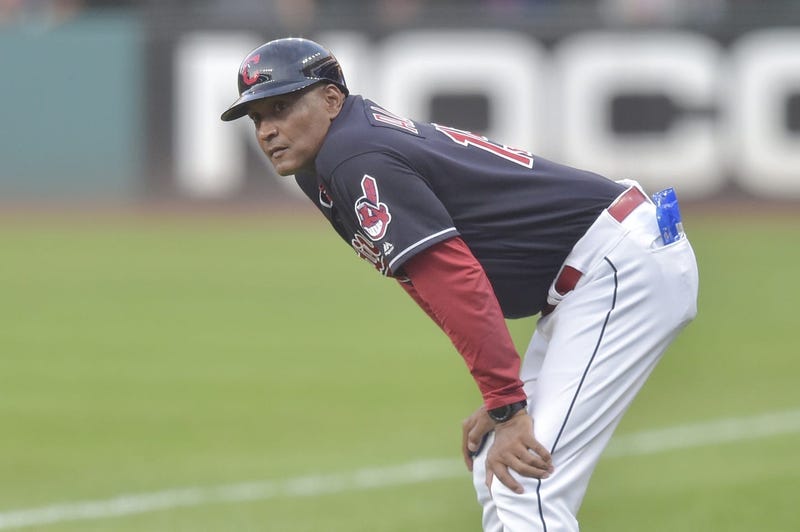 Sep 4, 2018; Cleveland, OH, USA; Cleveland Indians first base coach Sandy Alomar Jr. (15) reacts in the first inning against the Kansas City Royals at Progressive Field. Mandatory Credit: David Richard-USA TODAY Sports