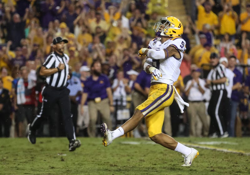 LSU Tigers safety Grant Delpit (9) celebrates after sacking Mississippi Rebels quarterback Jordan Ta'amu (not pictured) during the first quarter of a game at Tiger Stadium.