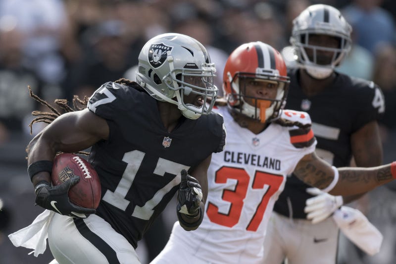 Oakland Raiders wide receiver Dwayne Harris (17) runs against Cleveland Browns defensive back Denzel Rice (37) during the fourth quarter at Oakland Coliseum.