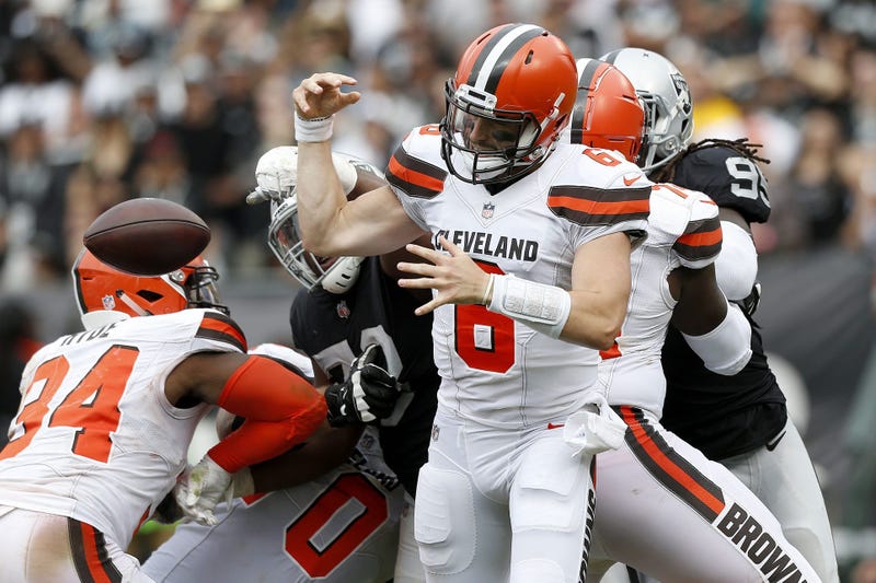 leveland Browns quarterback Baker Mayfield (6) has the ball knocked out of his hands by Oakland Raiders defensive tackle Maurice Hurst (73) in the third quarter at Oakland Coliseum