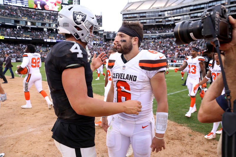 Sep 30, 2018; Oakland, CA, USA; Oakland Raiders quarterback Derek Carr (4) meets with Cleveland Browns quarterback Baker Mayfield (6) after the game at Oakland Coliseum. Mandatory Credit: Cary Edmondson-USA TODAY Sports