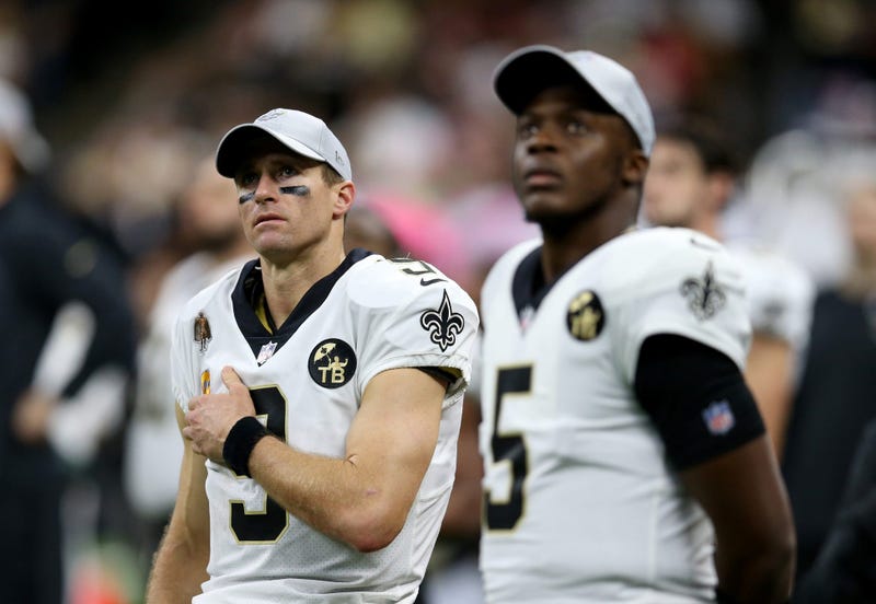 Oct 8, 2018; New Orleans, LA, USA; New Orleans Saints quarterbacks Drew Brees (9) and Teddy Bridgewater (5) look on in the second half against the Washington Redskins at the Mercedes-Benz Superdome.