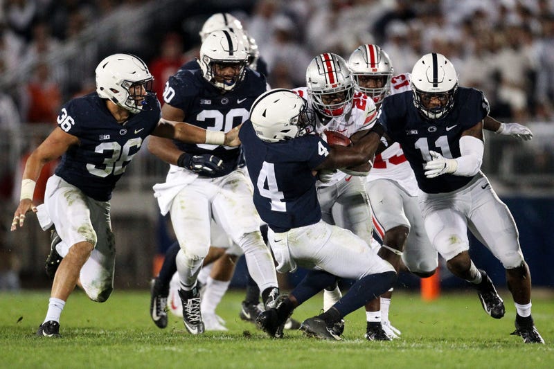 Penn State Nittany Lions safety Nick Scott (4) attempts to tackle Ohio State Buckeyes running back Mike Weber