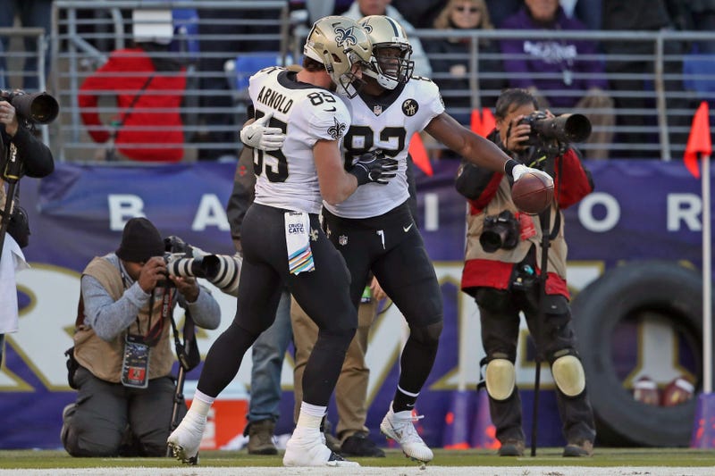 Oct 21, 2018; Baltimore, MD, USA; New Orleans Saints tight end Ben Watson (82) is congratulated by Dan Arnold (85) after catching Drew Brees 500th career touchdown pass during the game against the Baltimore Ravens at M&T Bank Stadium. 