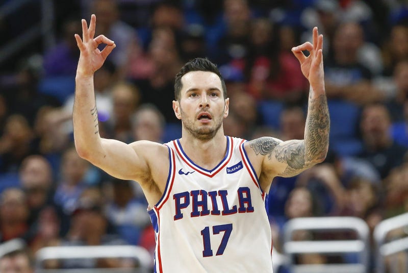 Nov 14, 2018; Orlando, FL, USA; Philadelphia 76ers guard JJ Redick (17) signals after a three-point basket during the second half against the Orlando Magic at Amway Center. 