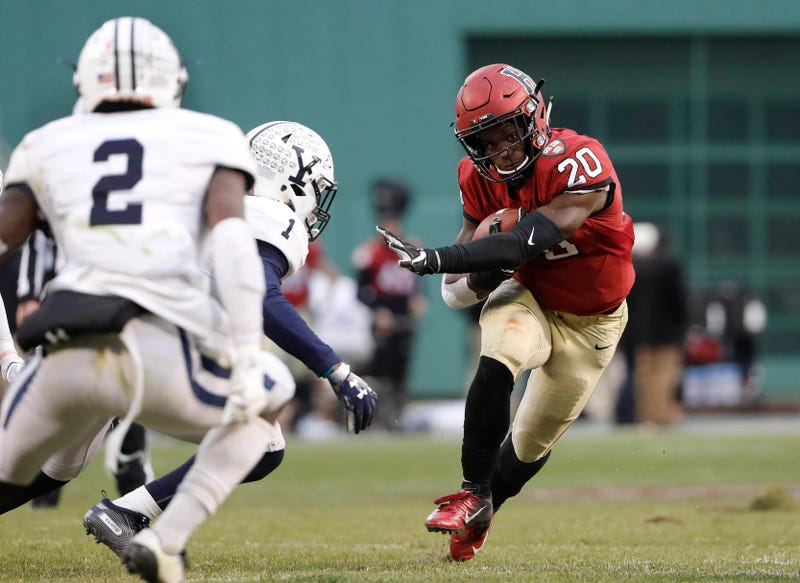 Nov 17, 2018; Boston, MA, USA; Harvard running back Aaron Shampklin (20) runs against the Yale during the second half at Fenway Park. Mandatory Credit: Winslow Townson-USA TODAY Sports