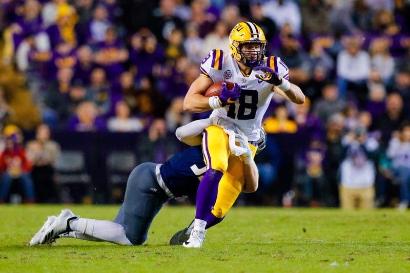 Nov 17, 2018; Baton Rouge, LA, USA; LSU Tigers tight end Foster Moreau (18) runs against Rice Owls in the first half at Tiger Stadium.