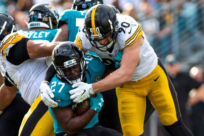 TJ Watt tackling Leonard Fournette