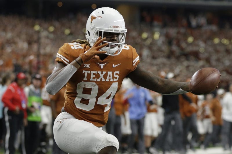 Dec 1, 2018; Arlington, TX, USA; Texas Longhorns wide receiver Lil'Jordan Humphrey (84) reacts to scoring a touchdown in the fourth quarter against the Oklahoma Sooners in the Big 12 championship game at AT&T Stadium