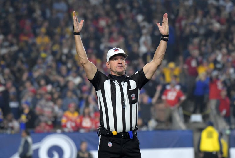 NFL referee Clete Blakeman (34) signals a touchdown