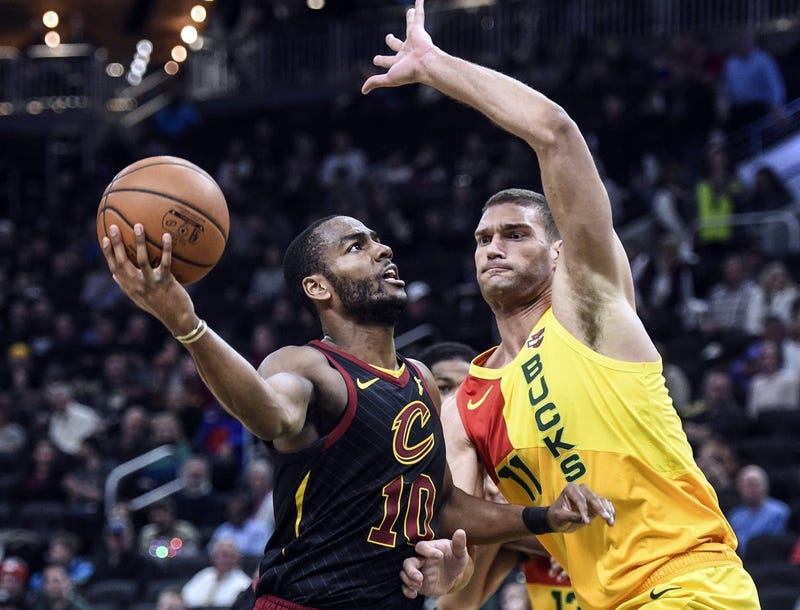 Dec 10, 2018; Milwaukee, WI, USA; Cleveland Cavaliers guard Alec Burks (10) takes a shot against Milwaukee Bucks center Brook Lopez (11) in the third quarter at the Fiserv Forum. Mandatory Credit: Benny Sieu-USA TODAY Sports