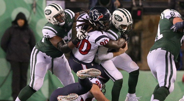 Houston Texans outside linebacker Jadeveon Clowney (90) sacks New York Jets quarterback Sam Darnold (14) during the fourth quarter at MetLife Stadium