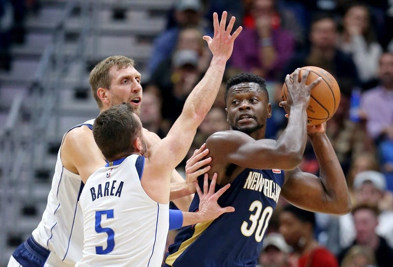 Dec 28, 2018; New Orleans, LA, USA; New Orleans Pelicans forward Julius Randle (30) is double teamed by Dallas Mavericks forward Dirk Nowitzki (41) and guard J.J. Barea (5) in the second quarter at the Smoothie King Center.