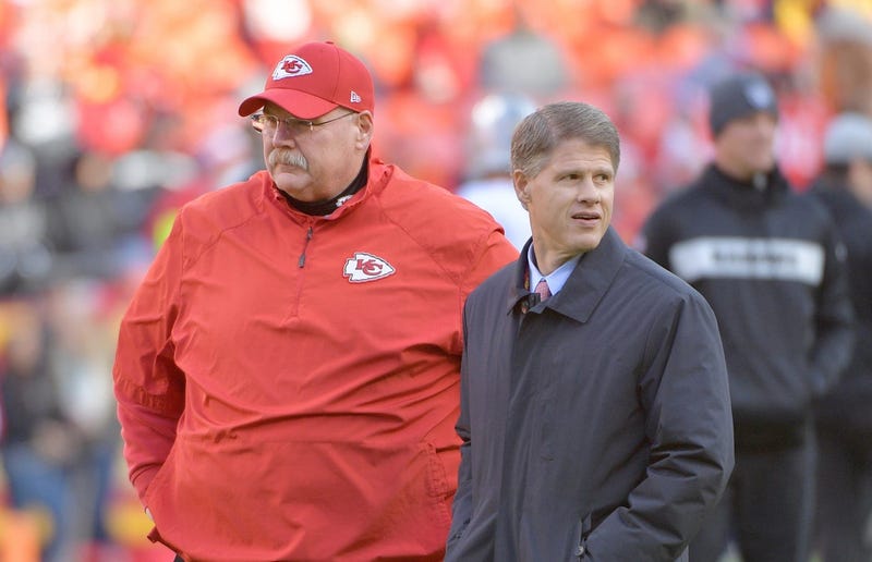 Kansas City Chiefs head coach Andy Reid (right) talks with chairman and CEO Clark Hunt