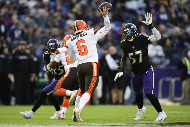 Dec 30, 2018; Baltimore, MD, USA; Cleveland Browns quarterback Baker Mayfield (6) throws as Baltimore Ravens inside linebacker C.J. Mosley (57) rushes during the first quarter at M&T Bank Stadium. Mandatory Credit: Tommy Gilligan-USA TODAY Sports