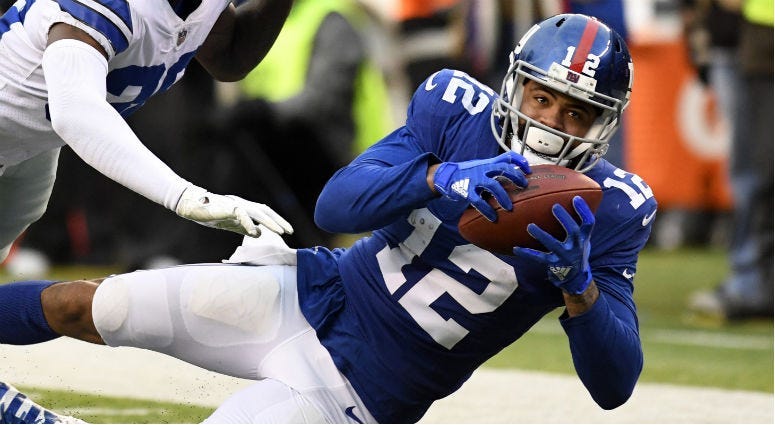 Cody Latimer catches the ball against Anthony Brown in the fourth quarter at MetLife Stadium.