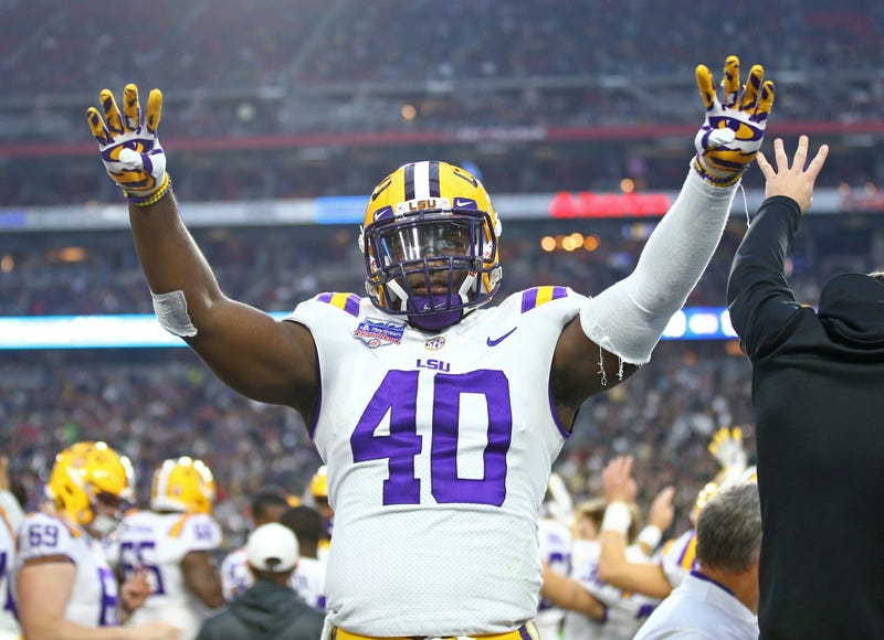 Jan 1, 2019; Glendale, AZ, USA; LSU Tigers linebacker Devin White (40) reacts in the fourth quarter against the UCF Knights in the 2019 Fiesta Bowl at State Farm Stadium.