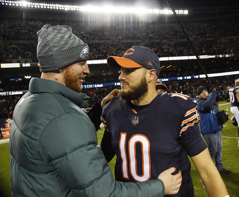 Chicago Bears quarterback Mitchell Trubisky (10) greets Philadelphia Eagles quarterback Carson Wentz (left) after a NFC Wild Card playoff football game at Soldier Field.