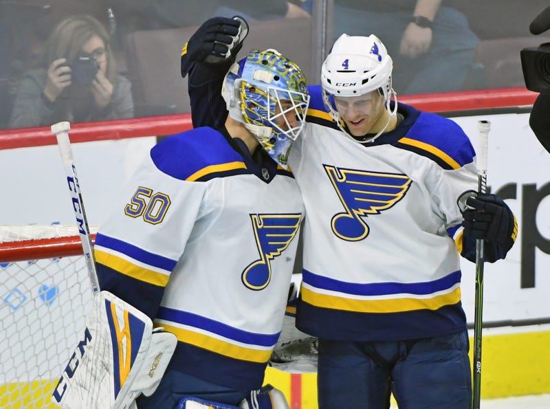 St. Louis Blues goaltender Jordan Binnington (50) celebrates with defenseman Carl Gunnarsson