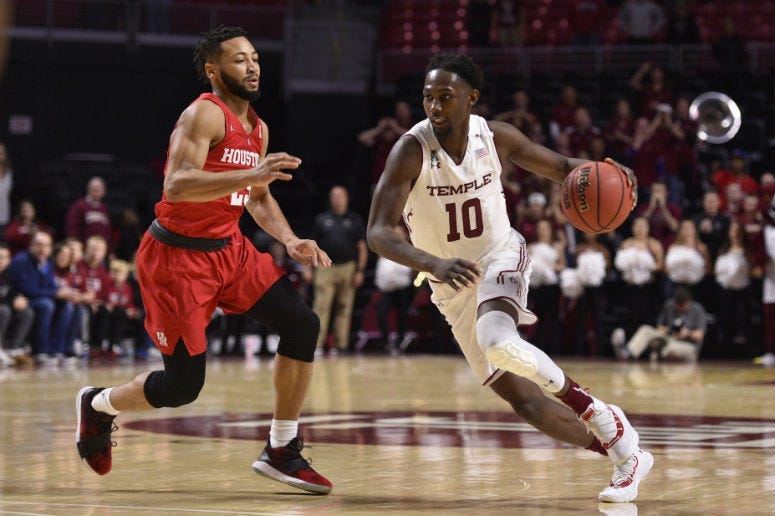 Jan 9, 2019; Philadelphia, PA, USA; Temple Owls guard Shizz Alston Jr. (10) dribbles past Houston Cougars guard Galen Robinson Jr. (25) during the second half at Liacouras Center.
