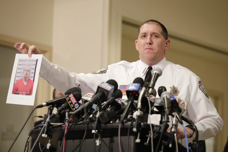 Mug shot of Jake Patterson is shown by sheriff Chris Fitzgerald