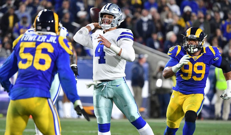 Jan 12, 2019; Los Angeles, CA, USA; Dallas Cowboys quarterback Dak Prescott (4) passes against the Los Angeles Rams in the third quarter in a NFC Divisional playoff football game at Los Angeles Memorial Coliseum. 