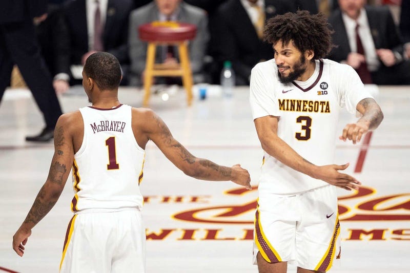 DuPree McBrayer and Jordan Murphy celebrate for the Gophers