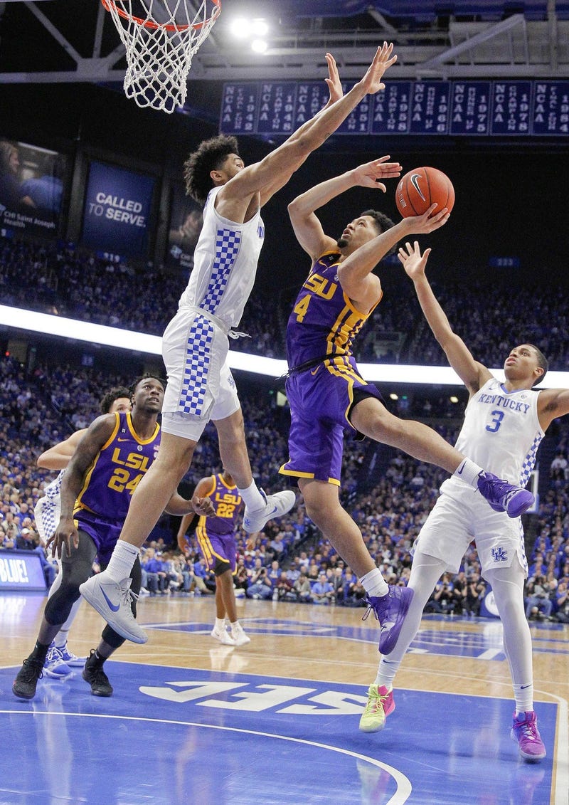 Feb 12, 2019; Lexington, KY, USA; LSU Tigers guard Skylar Mays (4) shoots the ball against Kentucky Wildcats forward Nick Richards (4) in the first half at Rupp Arena.
