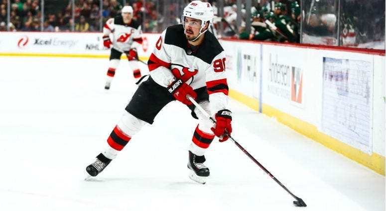Marcus Johansson skates with the puck in the first period against the Minnesota Wild at Xcel Energy Center.