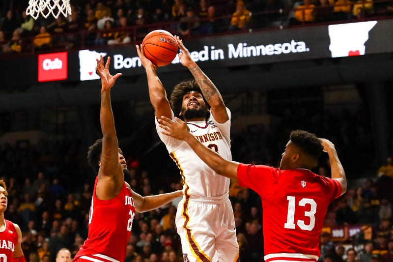 Gopher forward Jordan Murphy and the basketball