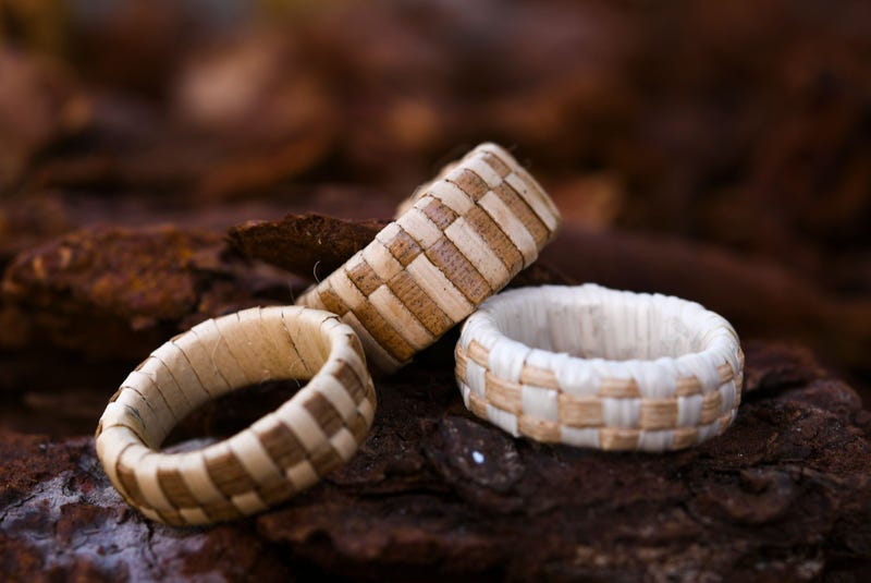 Pandanus wedding bands created by CHamoru weaver Mark Benavente. The rings, which are made from dried and dethorned pandanus leaves, are nearly waterproof. Bridal Woven Ring 05
