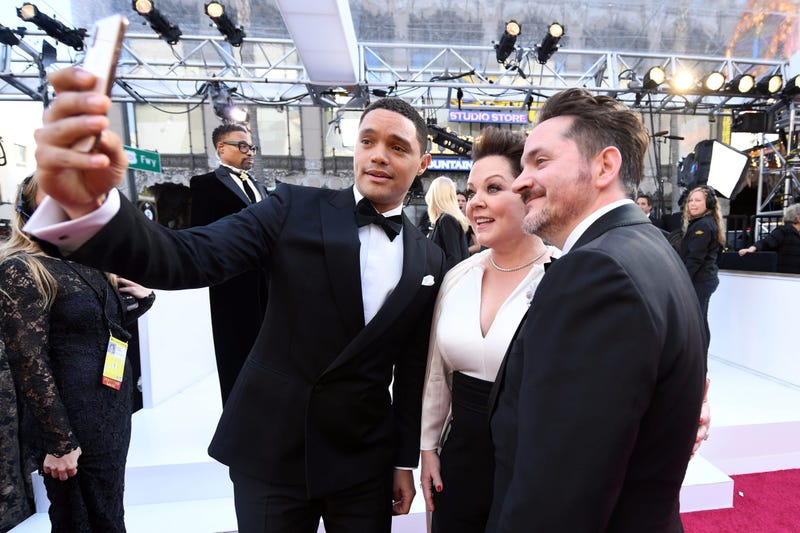 Trevor Noah, Melissa McCarthy and Ben Falcone
