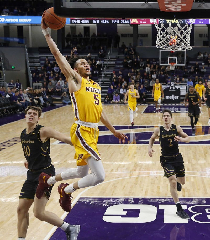 Amir Coffey with the dunk