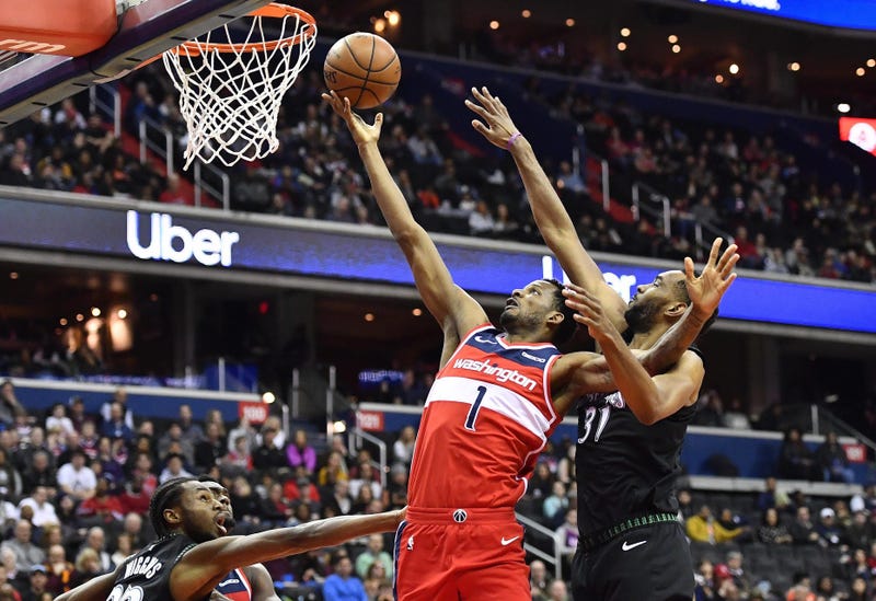 Sam Dekker goes to the hoop past Keita Bates Diop