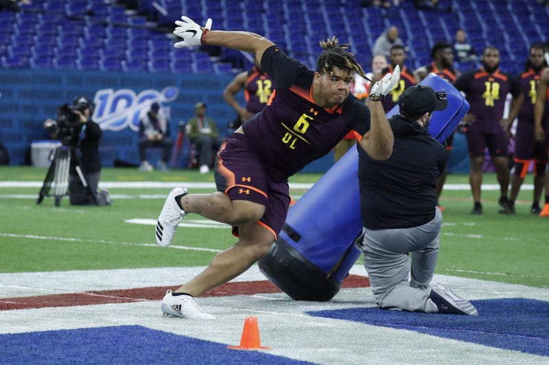 Mar 3, 2019; Indianapolis, IN, USA; Central Florida defensive lineman Trysten Hill (DL06) goes through workout drills during the 2019 NFL Combine at Lucas Oil Stadium. 