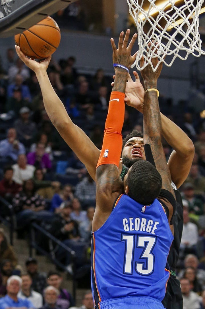 Karl-Anthony Towns to the basket  over Paul George