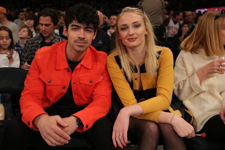 Mar 9, 2019; New York, NY, USA; American musician Joe Jonas (left) sits with British actress Sophie Turner during the first quarter between the New York Knicks and the Sacramento Kings at Madison Square Garden. Mandatory
