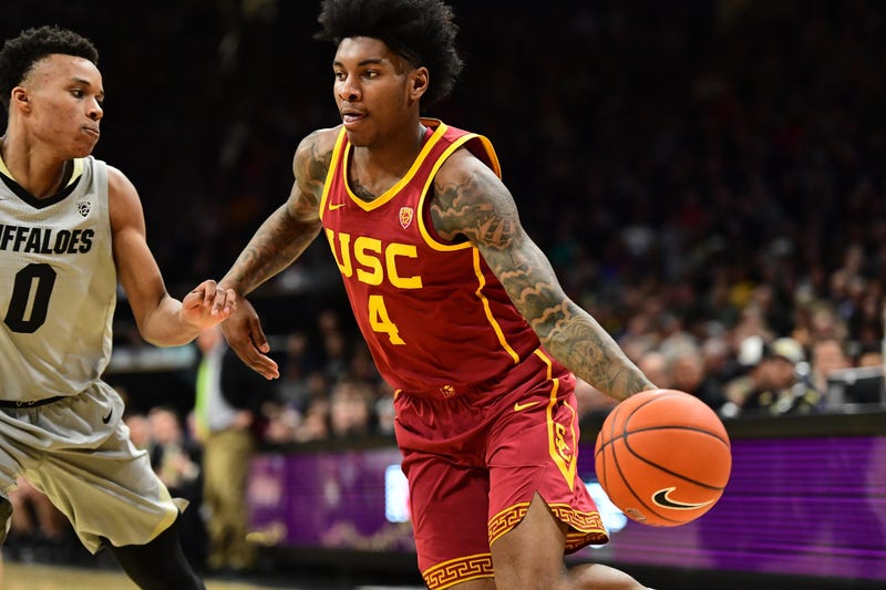 Mar 9, 2019; Boulder, CO, USA; USC Trojans guard Kevin Porter Jr. (4) drives on Colorado Buffaloes guard Shane Gatling (0) in the second half at the CU Events Center Mandatory Credit: Ron Chenoy-USA TODAY Sports
